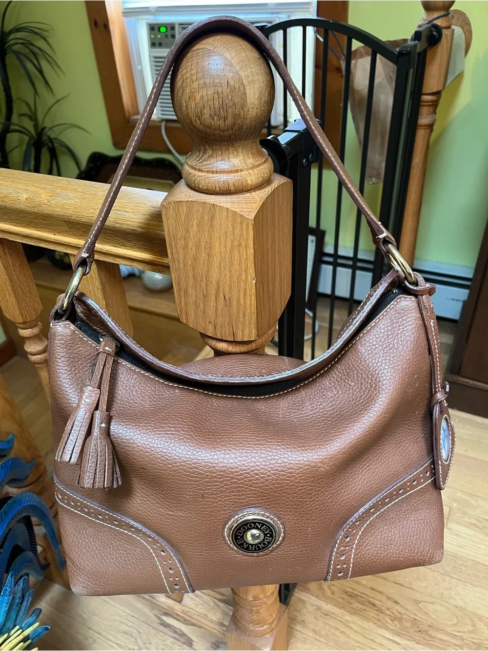 Dooney & Bourke Camel Brown Pebbled Leather Shoulder Bag with Tassel Emblem